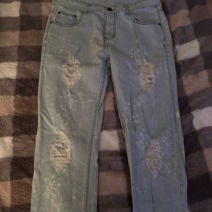 Distressed blue jeans